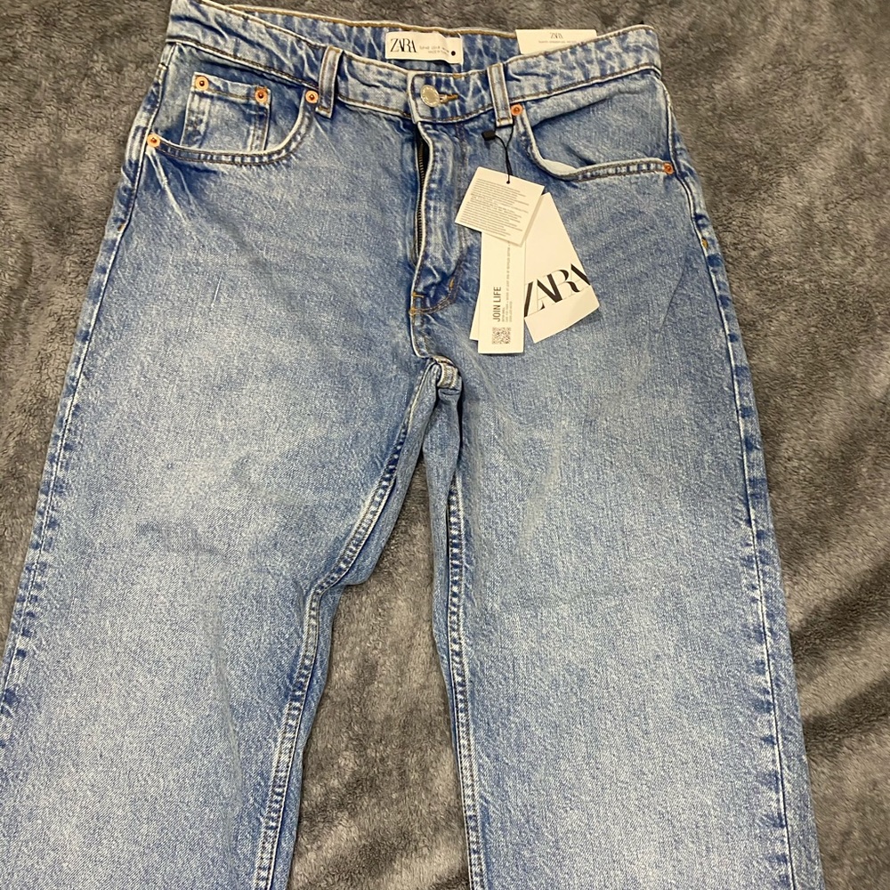 The mid waist straight in shae blue size 8